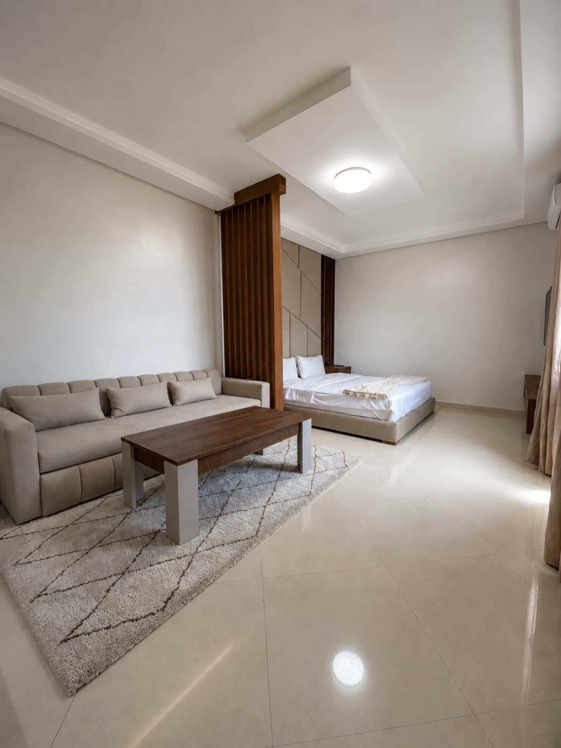 Living area with sofa bed and Berber rug
